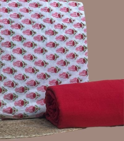 Ivory top blockprinted in a dense pink and green floral buti