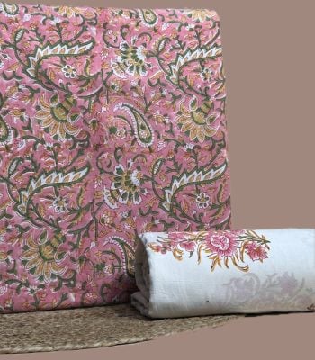 Pink top blockprinted in dense paisley florals with an ivory floral border printed bottom.