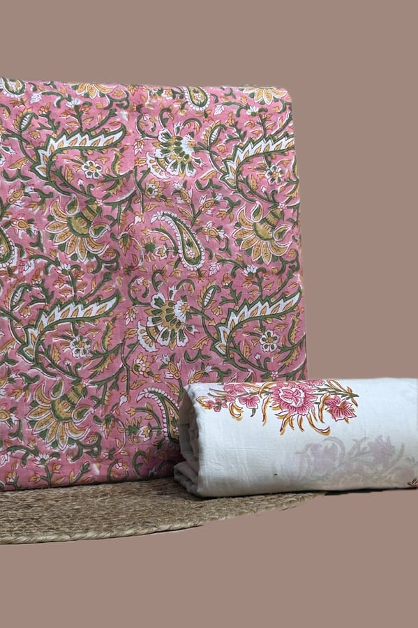 Pink top blockprinted in dense paisley florals with an ivory floral border printed bottom.