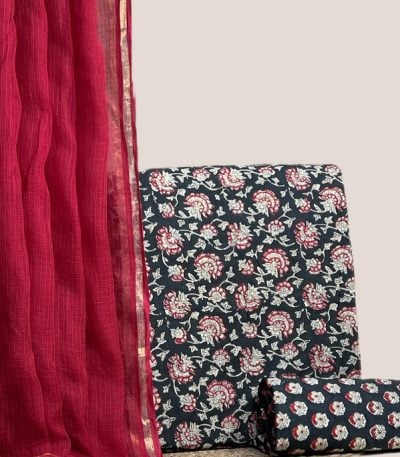 Sheer red AirLoom Kota dupatta with a black red-floral top and matching black buti bottom.