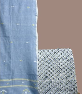 Sky blue handloom jamdani dupatta with lime butis and a blue floral buti blockprint top.