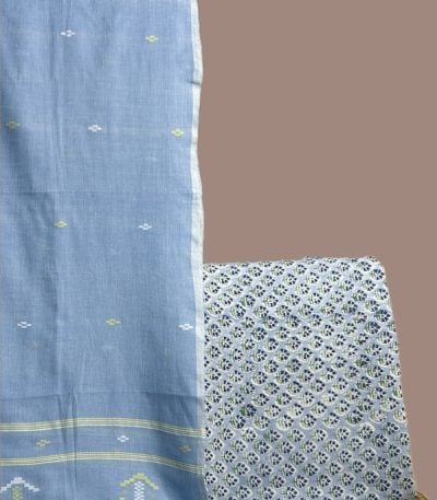 Sky blue handloom jamdani dupatta with lime butis and a blue floral buti blockprint top.
