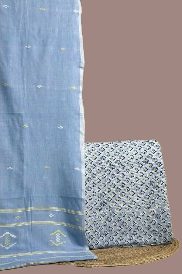 Sky blue handloom jamdani dupatta with lime butis and a blue floral buti blockprint top.