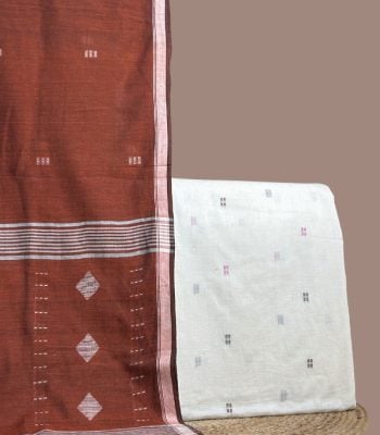 Rust handloom jamdani dupatta with diamond pallu and an ivory woven buti top.