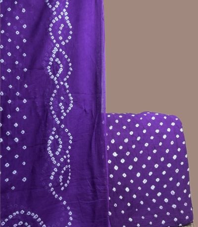Purple bandhani dupatta in wave tie dye with a matching purple dotted bandhani top.
