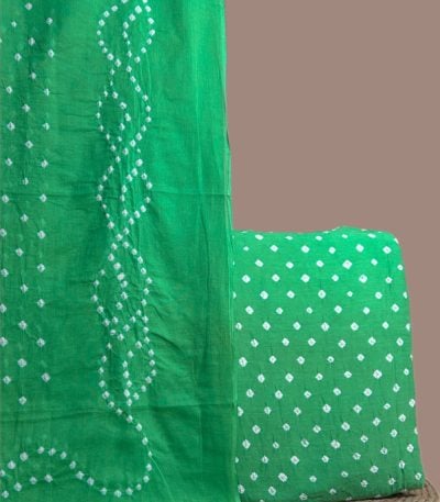 Green bandhani dupatta in wave tie dye with a matching green dotted bandhani top.