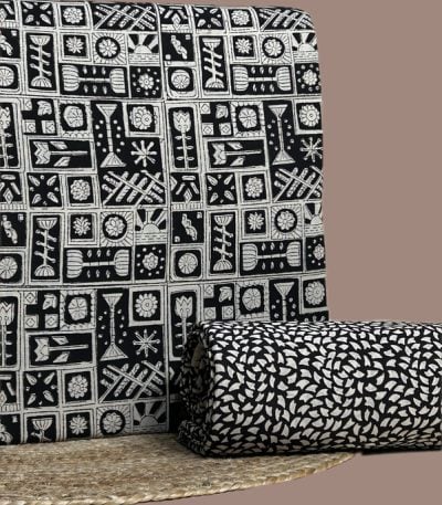 Black and white Bagru tile print top with matching black petal print bottom.