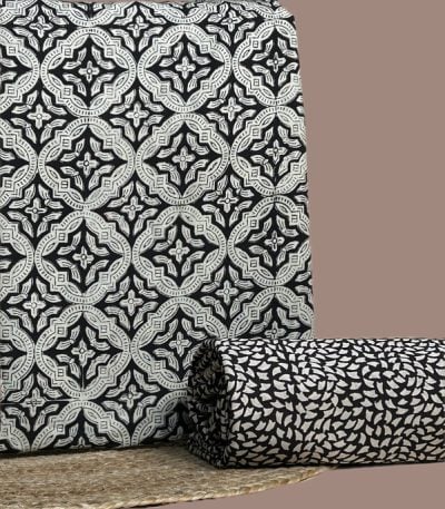 Black and white Bagru medallion print top with matching black petal print bottom.