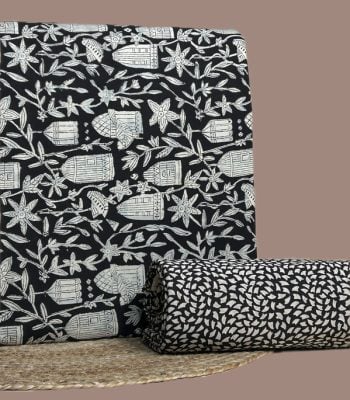 Black Bagru birdcage print top with matching black petal print bottom.