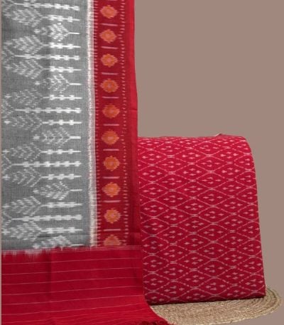 Red diamond ikkat top paired with gray ikkat dupatta with red motif border.