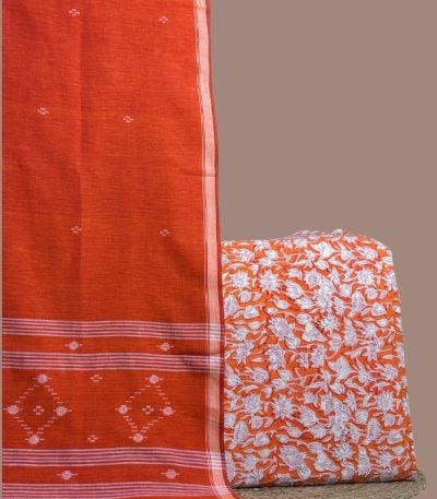 Orange-red blockprint floral top paired with matching handloom jamdani dupatta.