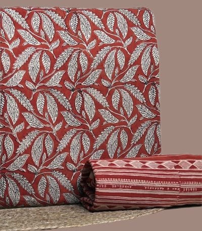 Red Bagru blockprint cotton set with bold leaf jaal top and striped bottom.