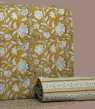 Yellow Bagru blockprint cotton set with floral vine top and striped floral bottom.