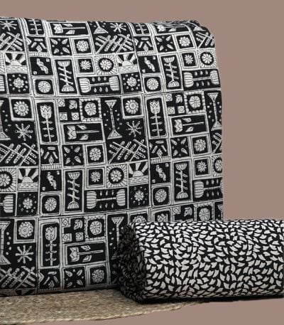Black Bagru blockprint cotton set with geometric folk tile top and petal-print bottom.