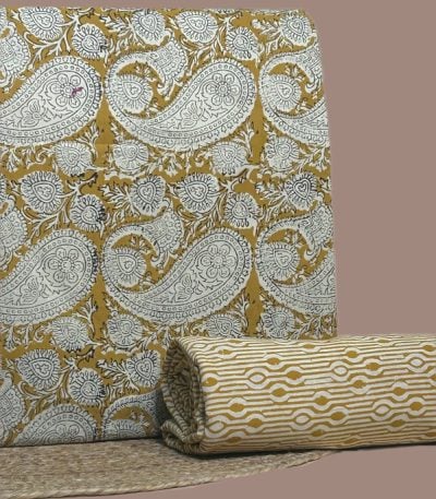Yellow Bagru blockprint cotton set with large paisley top and geometric stripe bottom.