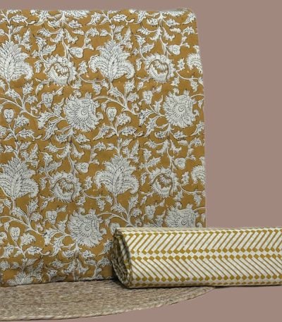 Yellow Bagru blockprint cotton set with floral jaal top and chevron-print bottom.
