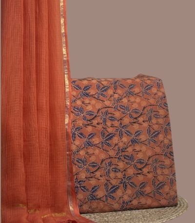 Orange AirLoom™ Kota dupatta paired with red blockprint top featuring blue leaf vines.