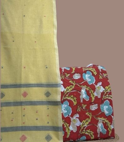 Yellow handloom jamdani dupatta paired with red floral blockprint soft cotton top.
