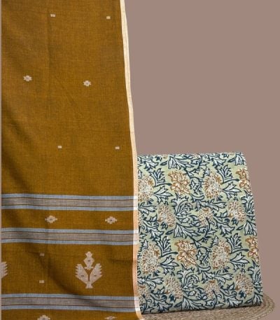 Mustard handloom jamdani dupatta paired with green floral blockprint soft cotton top.