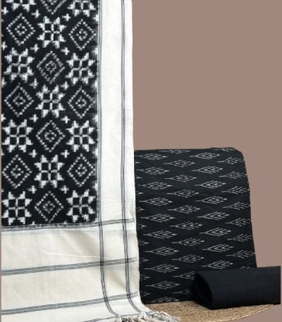Black teliya patola ikkat dupatta with black ikkat top and plain handloom bottom.