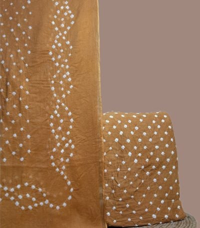 Brown bandhani cotton dupatta with wave dot pattern and dotted bandhani top.