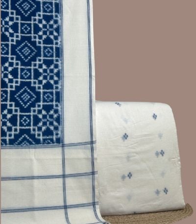Blue teliya patola ikkat dupatta with white handloom jamdani buti woven top.