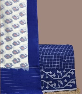 White paisley ikkat dupatta with blue check top and intricate jamdani woven border.