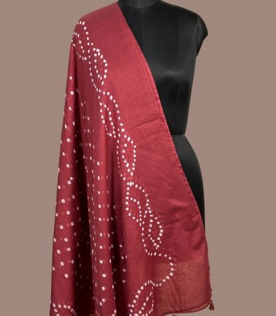 Maroon bandhani cotton dupatta with white wave dot pattern