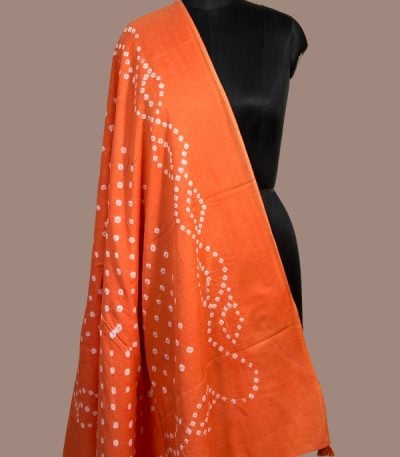 Tangerine orange bandhani cotton dupatta with white wave dot pattern and tassels. Authentic Hand Tie Dye Bandhani