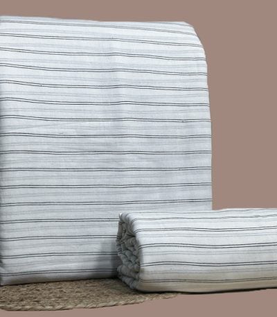 White handloom cotton top and bottom with fine black and gray woven pinstripes throughout.