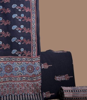 Black Ajrakh floral dupatta with black Ajrakh leaf top and striped Ajrakh bottom.